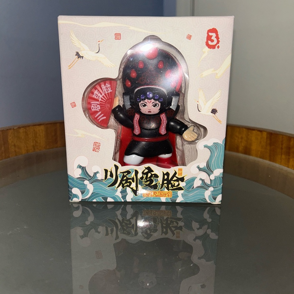 Kids Black and Red Toy Figure